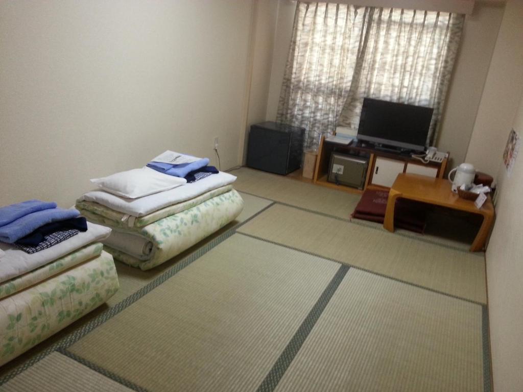 Hotel Hashimoto Sapporo Rum bild